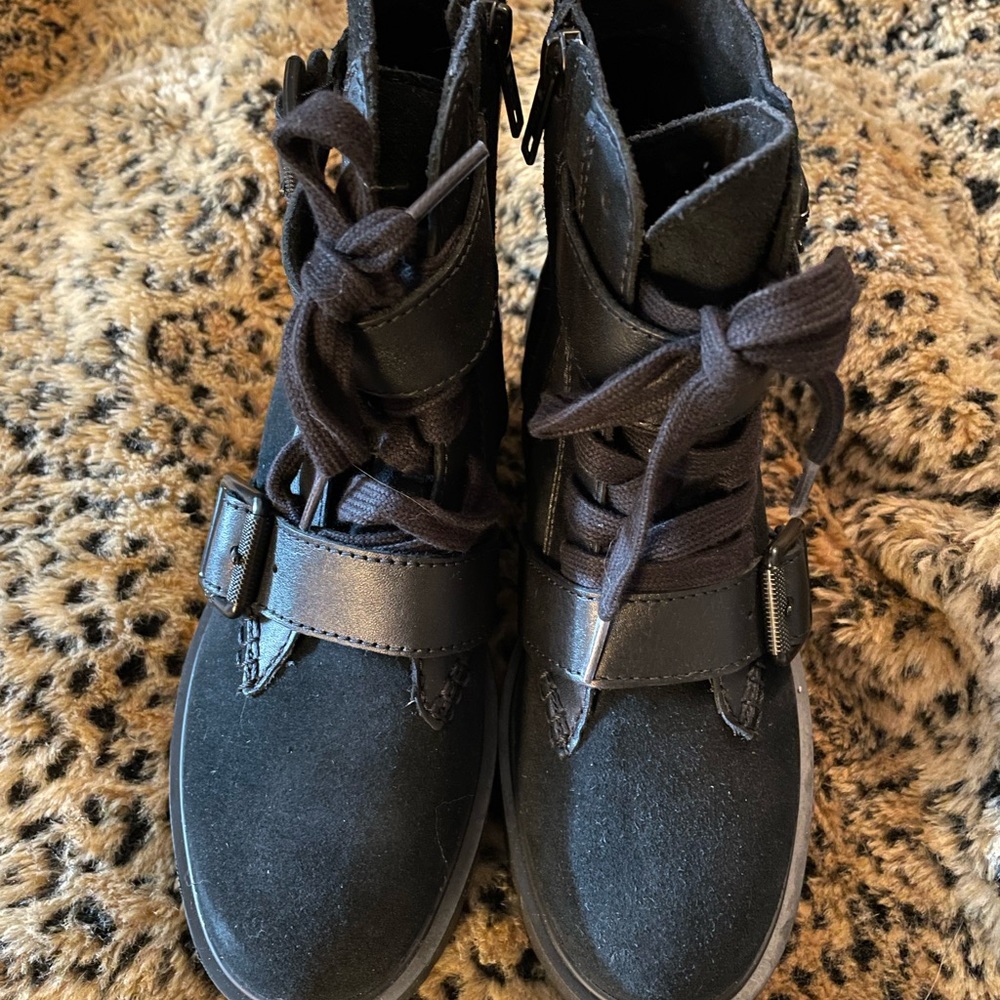 Women’s Shoes UGG water proof leather biker boots A 6.5 or 7 might fit better.